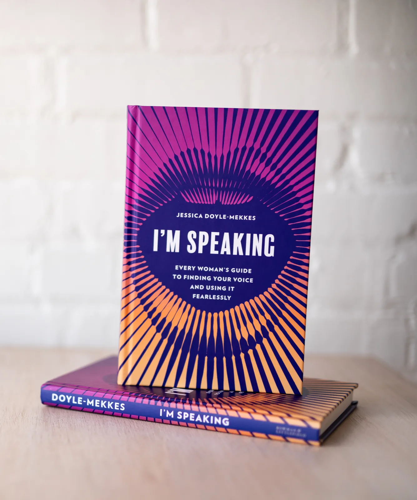 I'm Speaking by Jessica Doyle-Mekkes, standing on a stack of books.